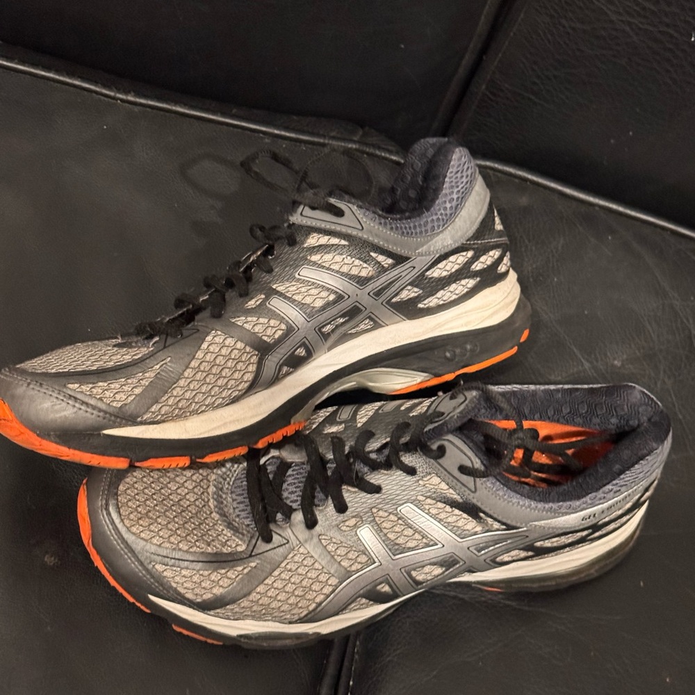 Asics Gray and Black Running Shoes with Orange Accents
